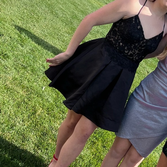 Short Black Corset dress. It was pockets and it is so comfy to wear. - Picture 5 of 5